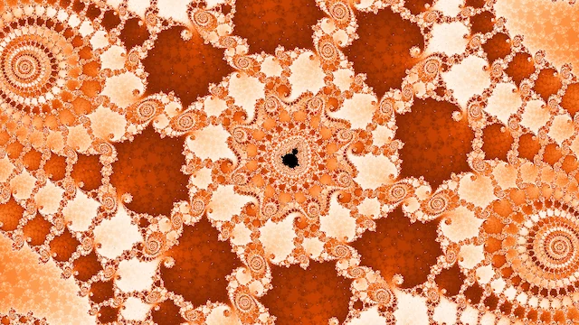 A tiny copy of the set at the center of a star of cream and orange filigree, with spirals at the corners.