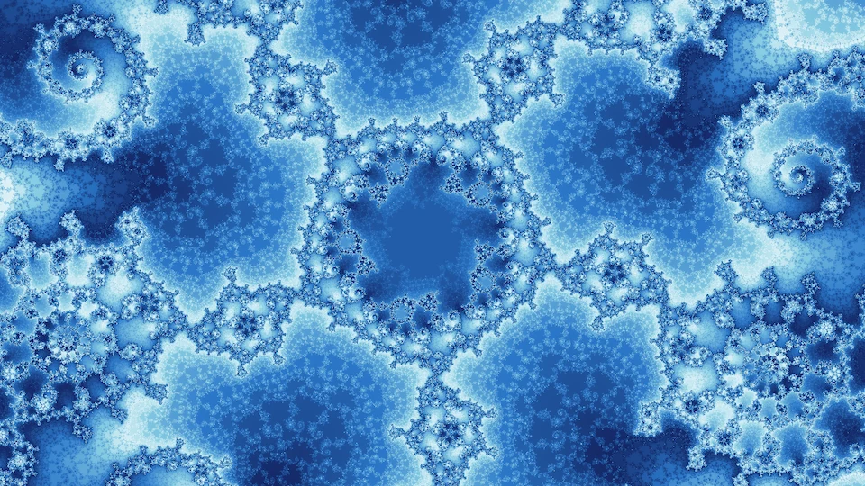 The degree-5 Julia set for that point: rings of pale blue filigree around dark blue pools, with spirals at the sides.