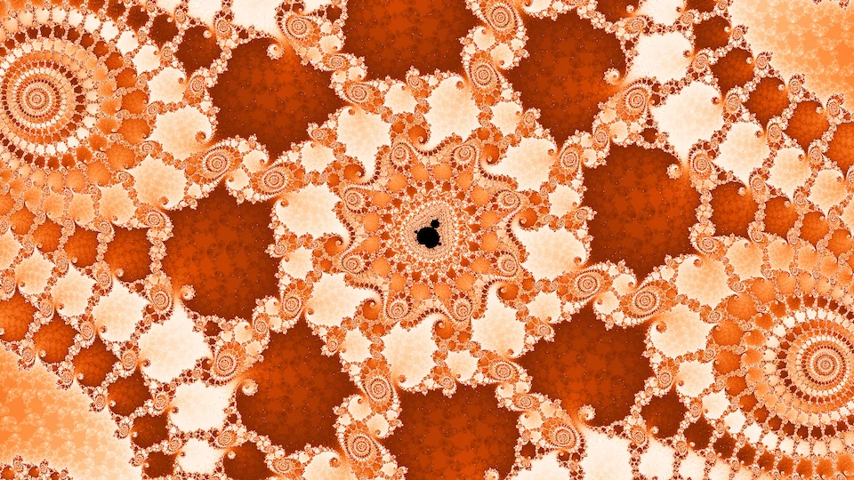 A tiny copy of the set at the center of a star of cream and orange filigree, with spirals at the corners.