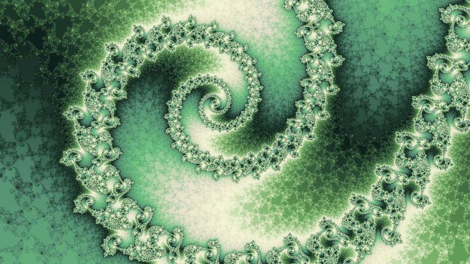 One broad spiral of pale green filigree over mottled green.