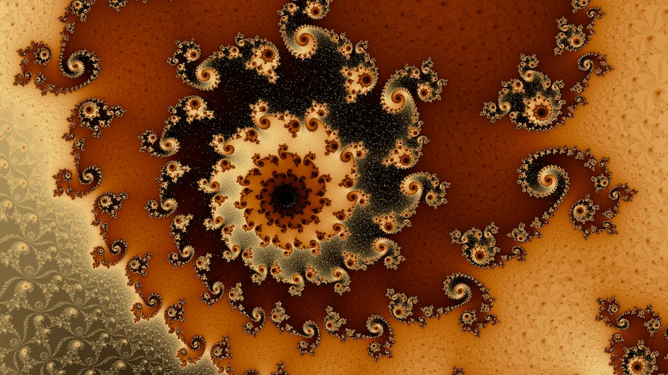 The deep frame at the center of the shallow one: rings of small curled spirals around a dark eye, in rust, cream, and black, with a field of finer filigree at lower left.