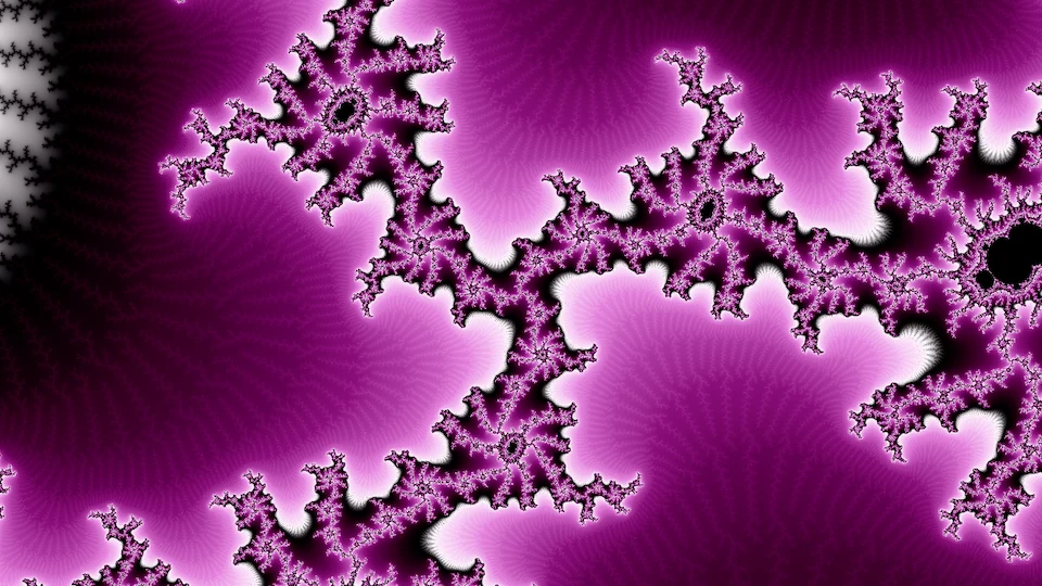 The parameter plane zoomed in at c: the same chain almost line for line, with small dark copies of the set in its knots and a larger black one at the right edge.